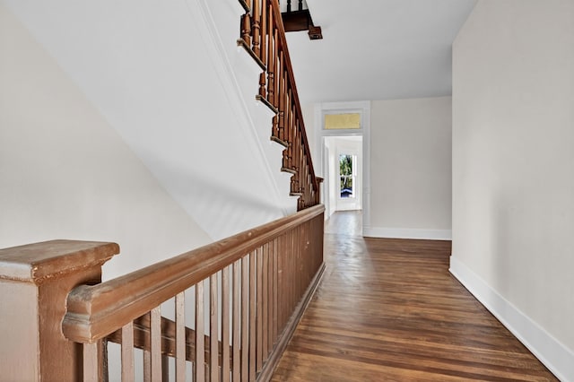 corridor with dark wood-type flooring