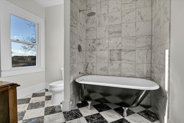 bathroom with vanity, tile flooring, a tub, and toilet