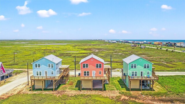 aerial view with a water view and a rural view