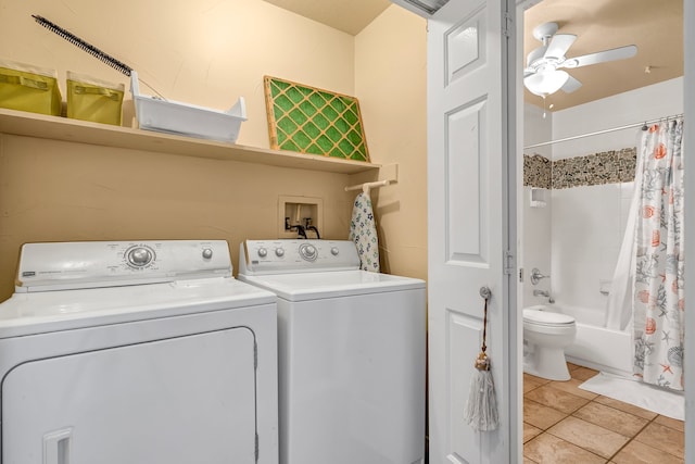 laundry room featuring washer and dryer, light tile floors, and ceiling fan