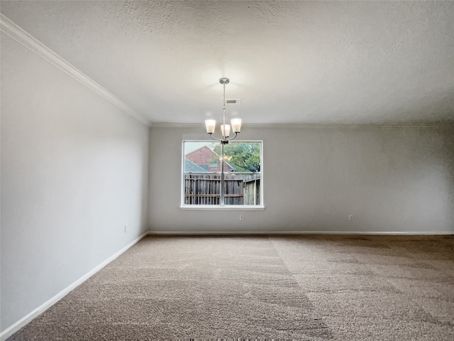 carpeted empty room with an inviting chandelier, a textured ceiling, and crown molding