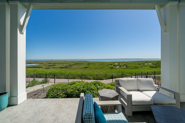 view of terrace featuring outdoor lounge area and a rural view