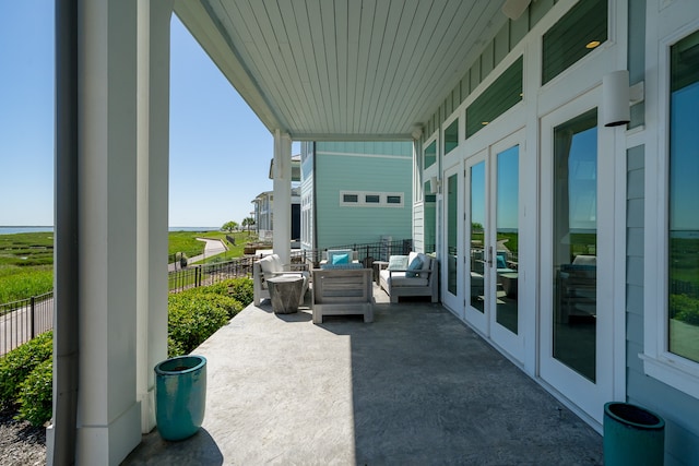 view of terrace with an outdoor hangout area and french doors