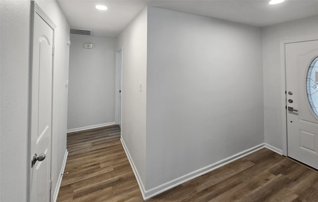 foyer with dark hardwood / wood-style flooring