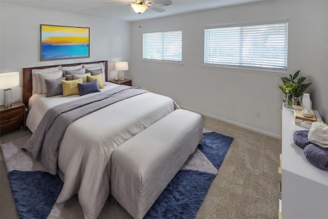 bedroom with light carpet and ceiling fan