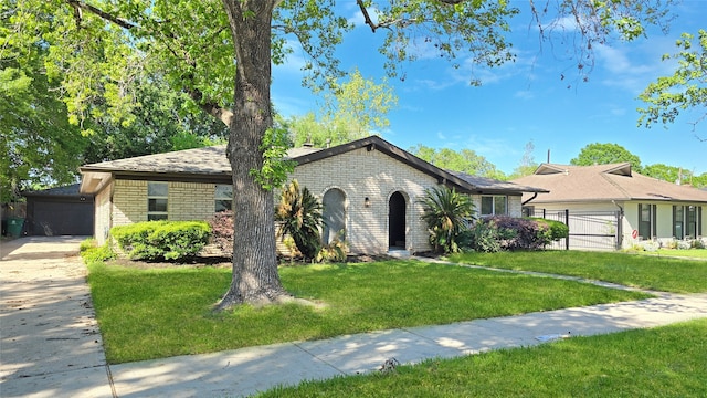 ranch-style house with a front lawn