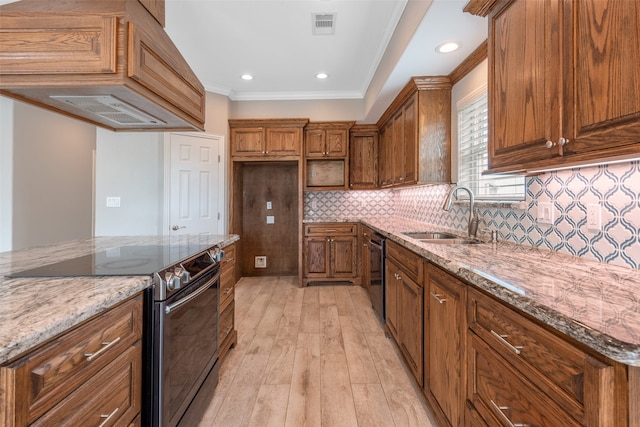 kitchen with backsplash, light hardwood / wood-style flooring, electric range, sink, and ornamental molding