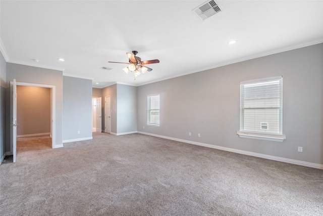 empty room with light carpet, ceiling fan, and crown molding