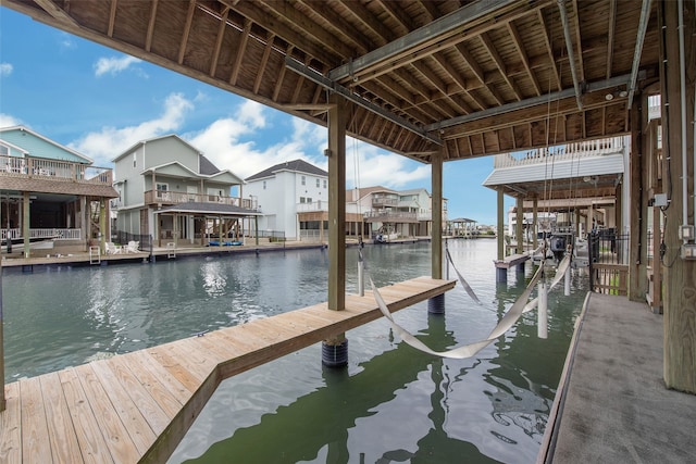 view of dock with a water view