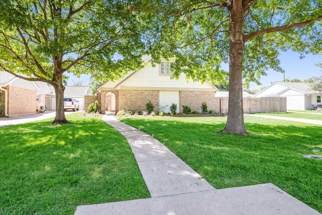 view of front of home featuring a front lawn