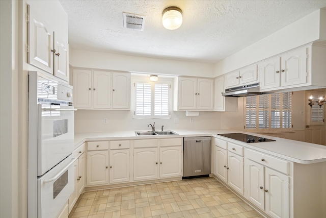 kitchen featuring white cabinetry