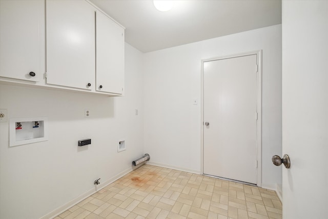 laundry area with cabinets, hookup for a washing machine, electric dryer hookup, light tile flooring, and hookup for a gas dryer