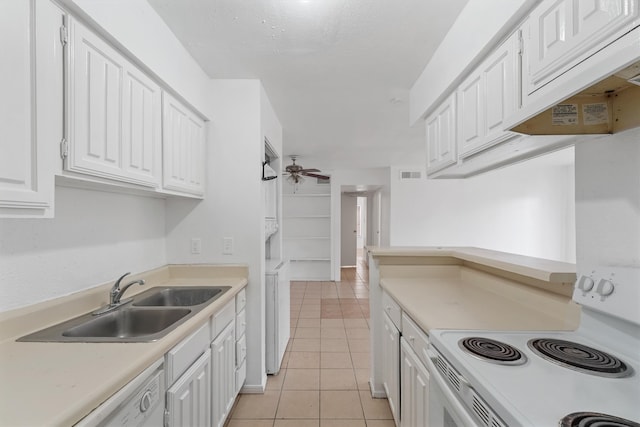 kitchen with white cabinetry, ceiling fan, light tile flooring, premium range hood, and stove