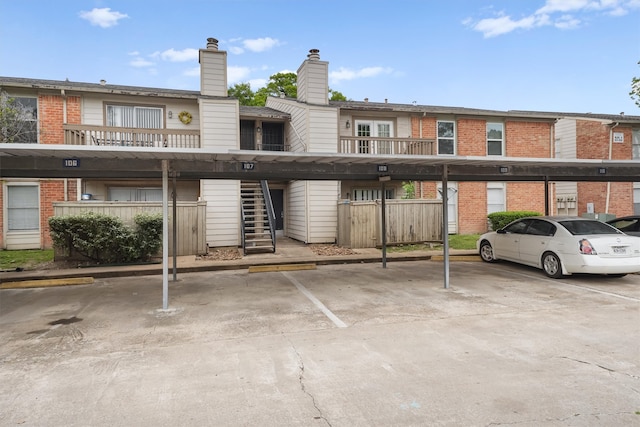 view of parking featuring a carport