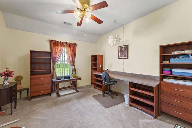 carpeted office space with ceiling fan and lofted ceiling