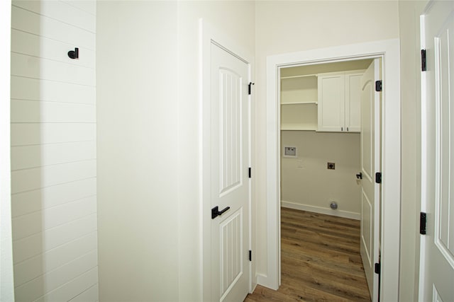 laundry room with dark hardwood / wood-style floors, cabinets, and hookup for an electric dryer