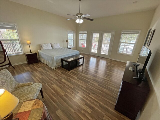 bedroom with ceiling fan, dark wood-type flooring, and access to outside