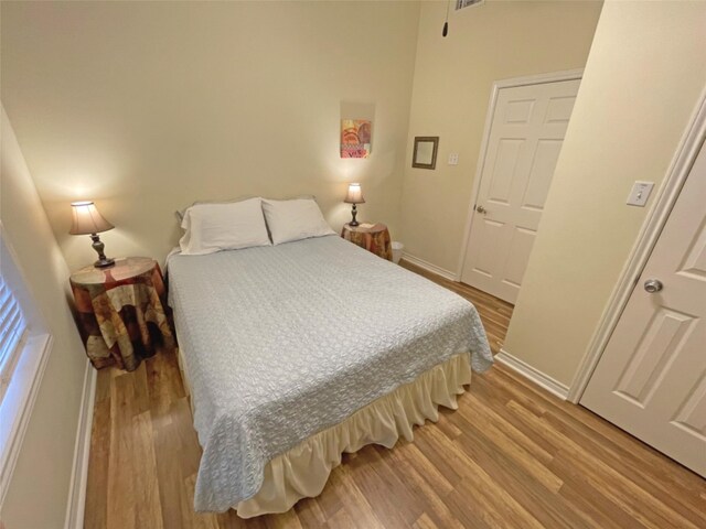 bedroom featuring light wood-type flooring