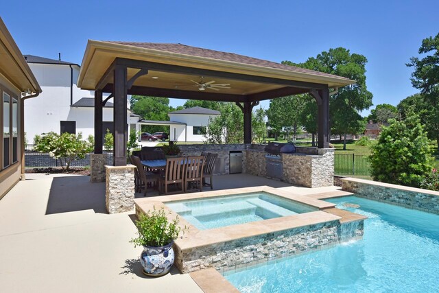 view of swimming pool with a gazebo, a grill, ceiling fan, and an in ground hot tub