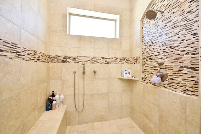 bathroom featuring tiled shower