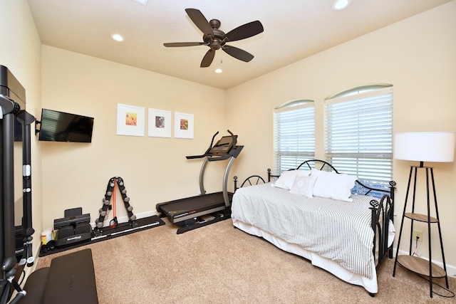 carpeted bedroom featuring ceiling fan