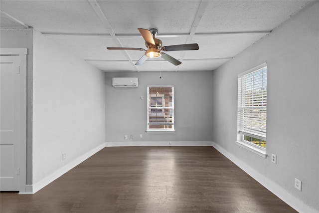 unfurnished room featuring ceiling fan, an AC wall unit, and dark hardwood / wood-style floors