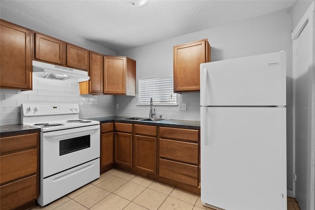 kitchen featuring light tile flooring, sink, white appliances, and tasteful backsplash