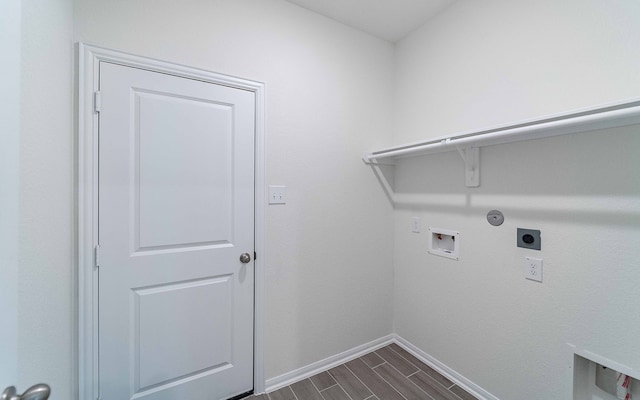 washroom with washer hookup, gas dryer hookup, dark hardwood / wood-style floors, and electric dryer hookup