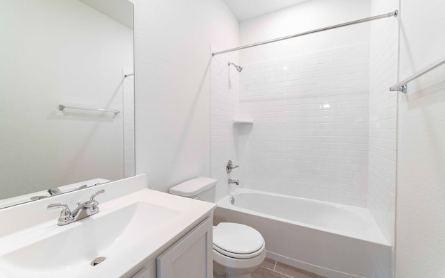 full bathroom featuring vanity, toilet, and tiled shower / bath combo