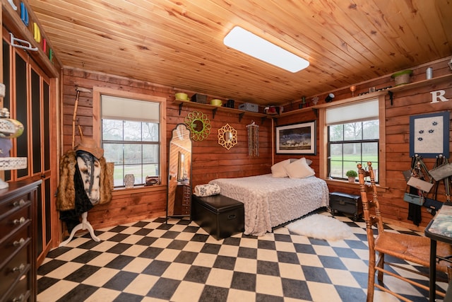 tiled bedroom featuring wood ceiling