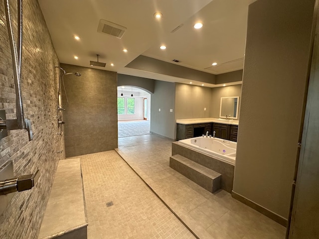 bathroom with tile floors and vanity