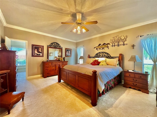 bedroom with ceiling fan, crown molding, and light carpet