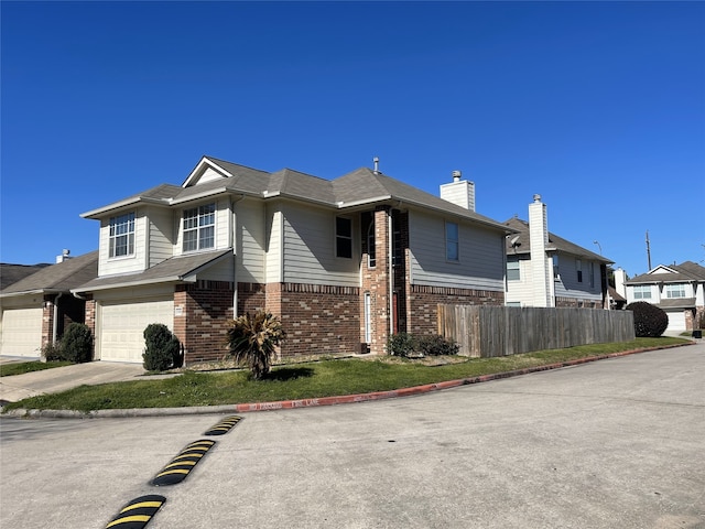 view of front of home with a garage