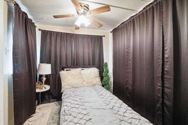 bedroom featuring ceiling fan