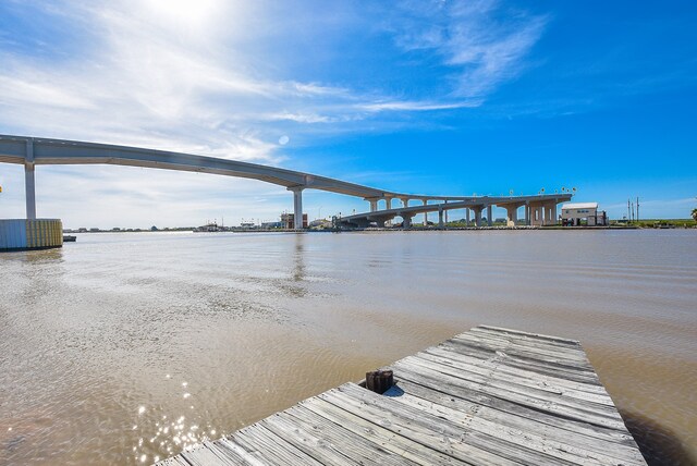 view of dock with a water view