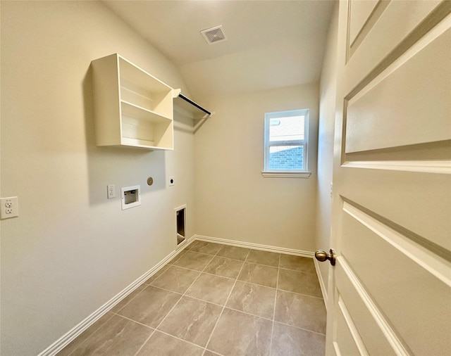 washroom with gas dryer hookup, hookup for a washing machine, light tile patterned floors, and hookup for an electric dryer