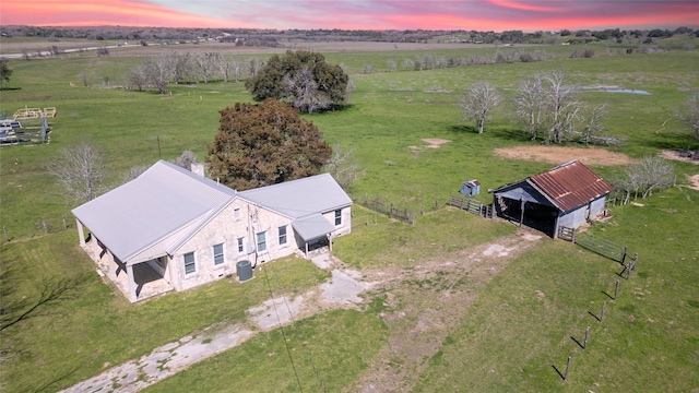 aerial view at dusk with a rural view