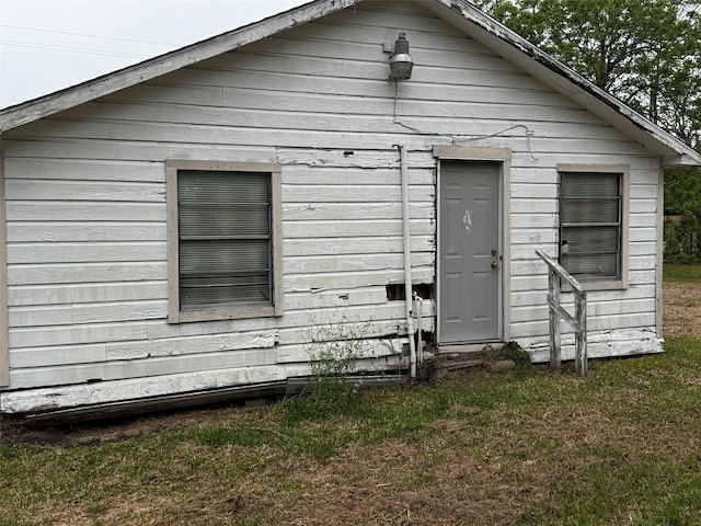 exterior space featuring a yard