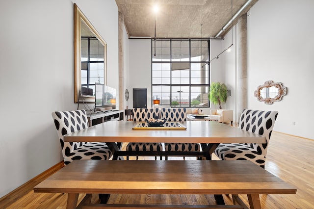 dining area with light wood-type flooring