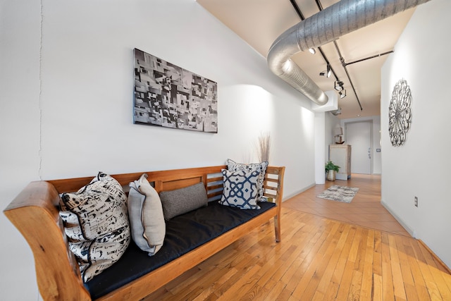 living room with light hardwood / wood-style flooring