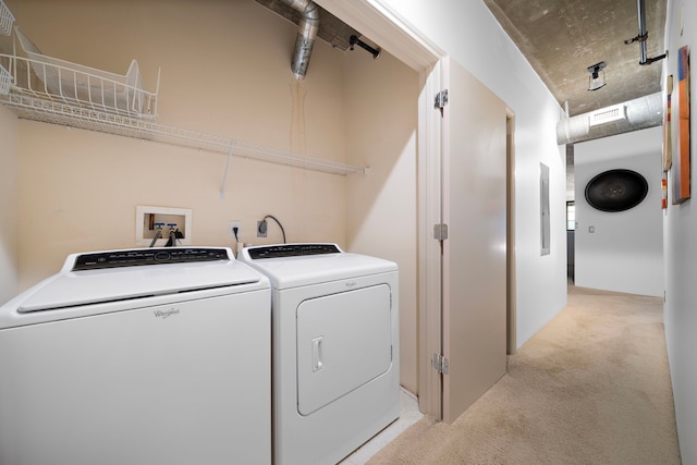 laundry room featuring washer and dryer, light colored carpet, and hookup for a washing machine