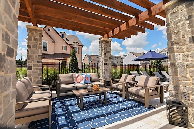 view of patio with an outdoor living space and a pergola