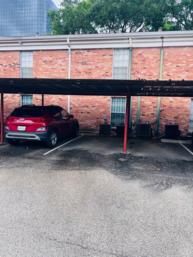 view of car parking featuring a carport