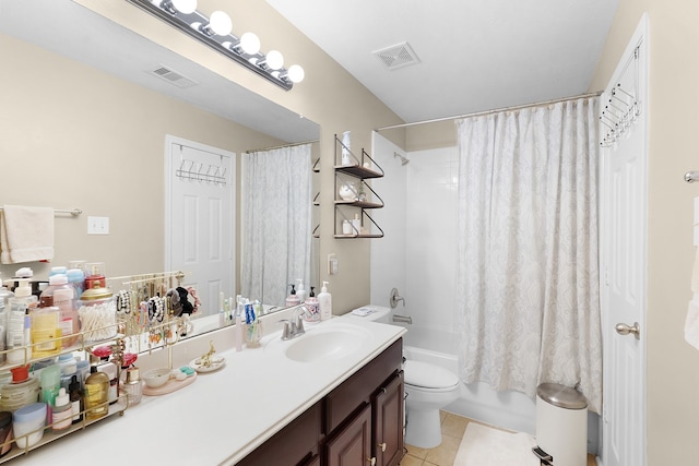 full bathroom with tile floors, toilet, vanity with extensive cabinet space, and shower / bath combination with curtain