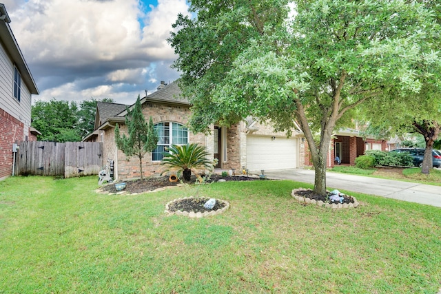 view of front facade with a garage and a front yard