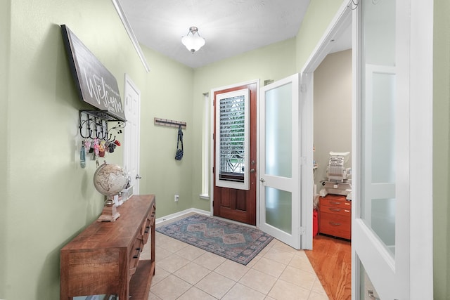 view of tiled foyer