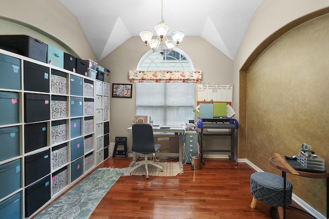 home office with a notable chandelier, vaulted ceiling, and dark hardwood / wood-style floors