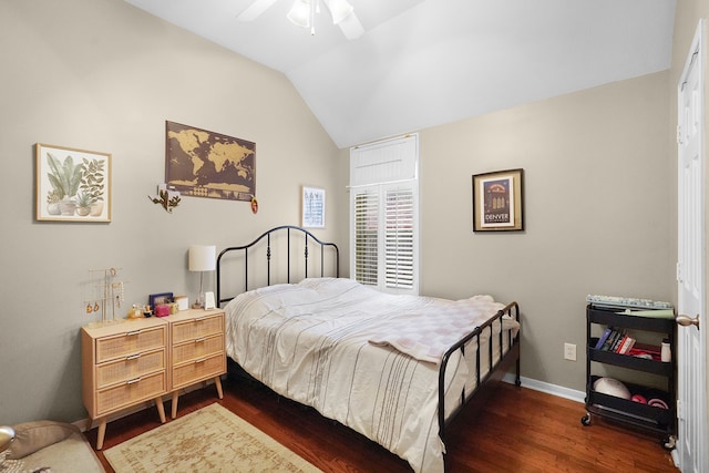 bedroom featuring vaulted ceiling, ceiling fan, and dark hardwood / wood-style floors