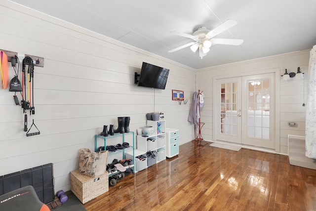 interior space with french doors, ceiling fan, and dark hardwood / wood-style floors