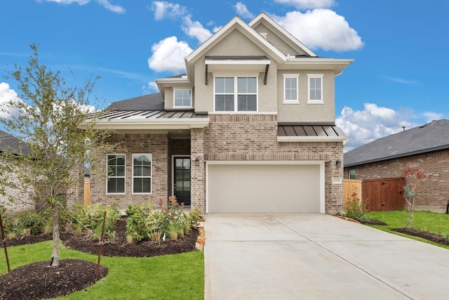 view of front facade with a front lawn and a garage